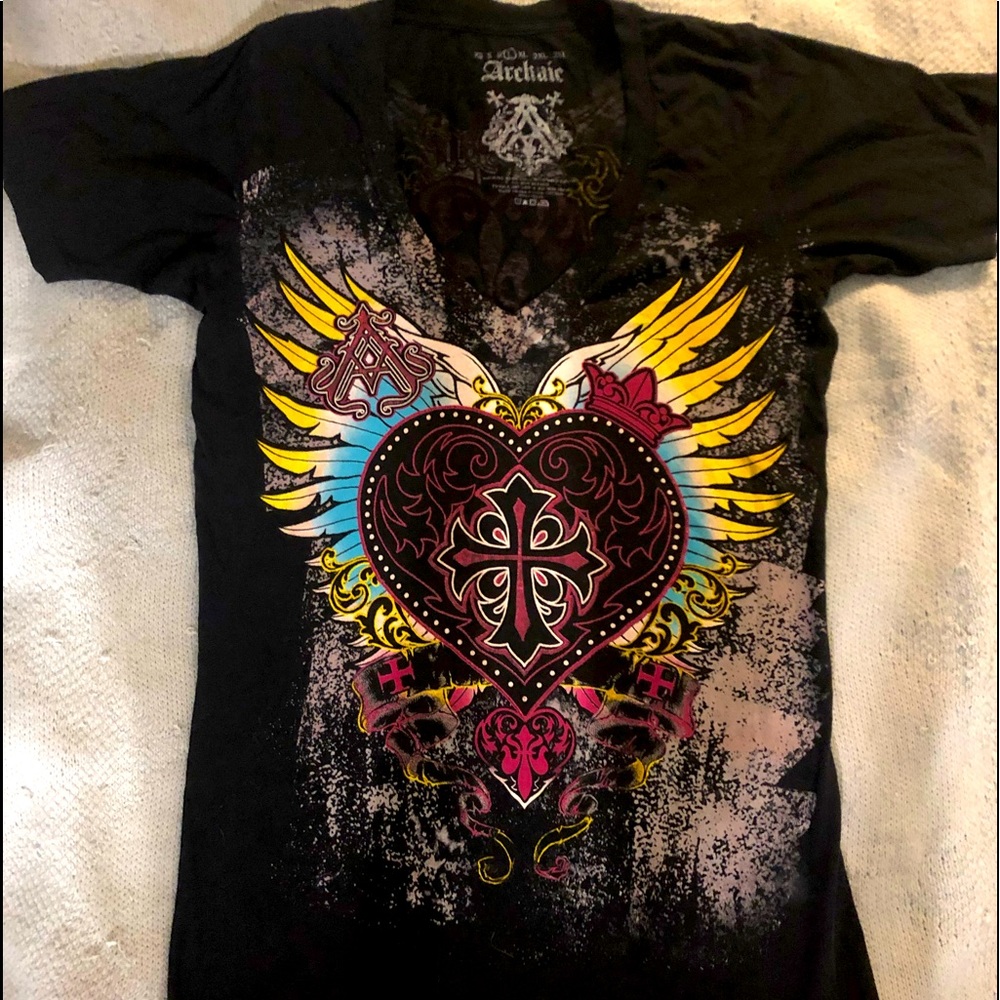 Women’s graphic tops size large. Brand is Archaic.